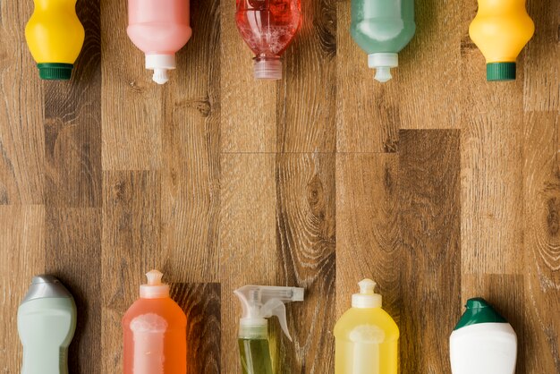 Flat lay composition of cleaning products with copyspace