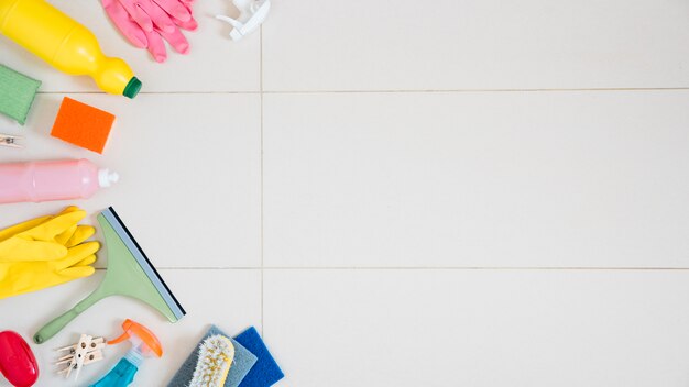 Flat lay composition of cleaning products with copyspace
