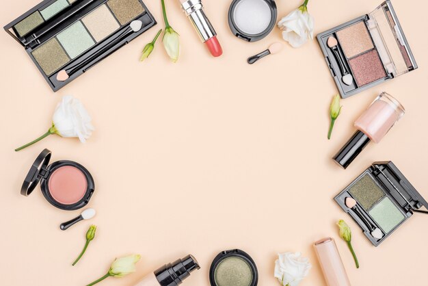 Flat lay composition of cosmetics with copy space