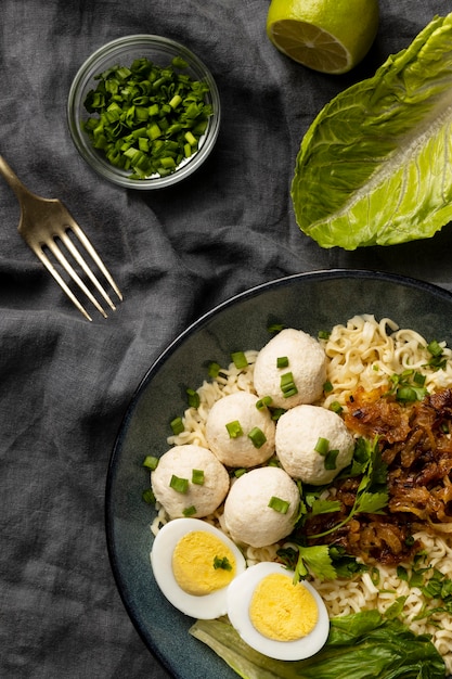 Free photo flat lay composition of delicious indonesian bakso