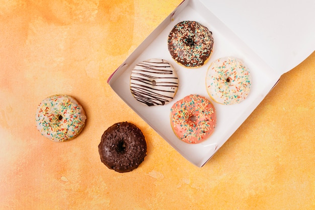 Flat lay composition of donuts