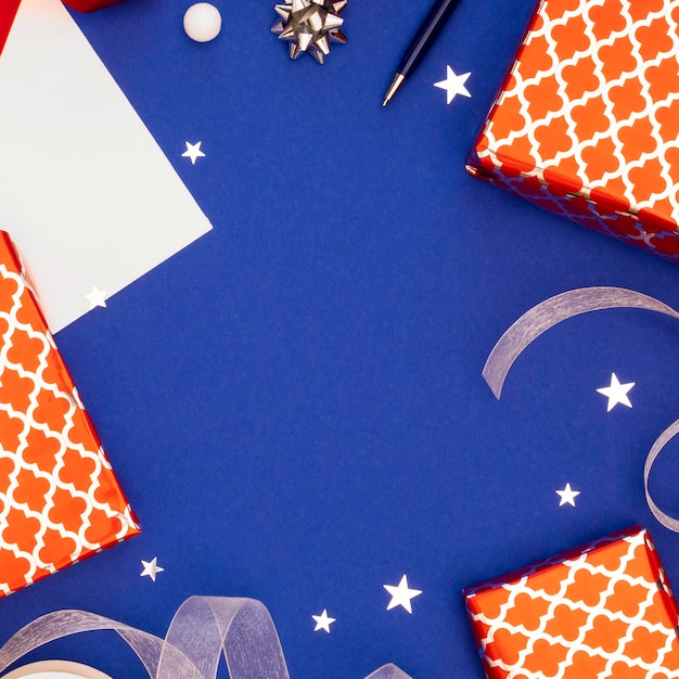 Free photo flat lay composition of festive wrapped gifts