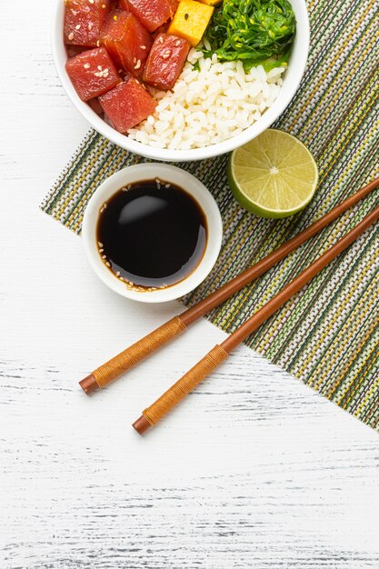 Flat lay composition of hawaiian poke bowl