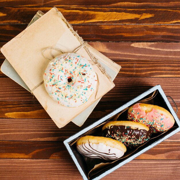 Flat lay composition of tasty donuts