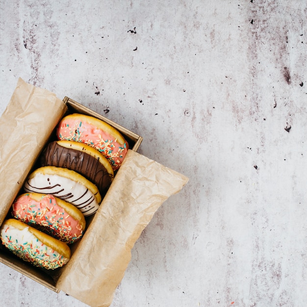 Flat lay composition of tasty donuts