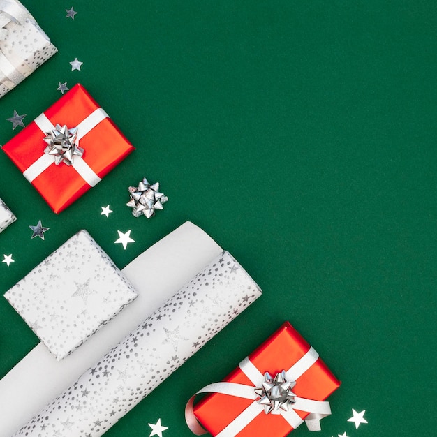 Flat lay composition of wrapped gifts with copy space