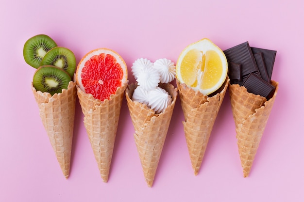 Flat lay of cones with fruits