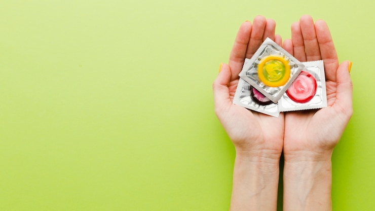 Free Photo flat lay contraception method composition with copy space