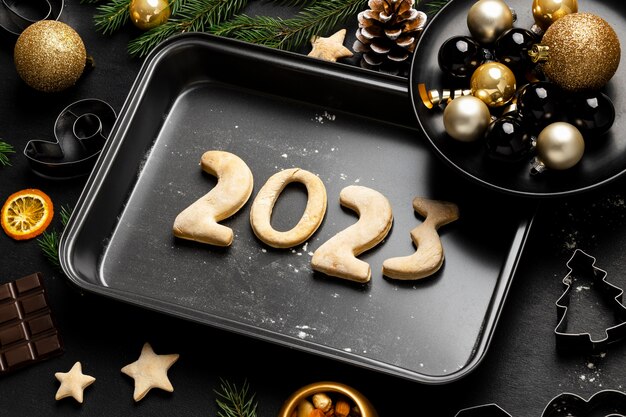 Flat lay cookies on tray new year celebration