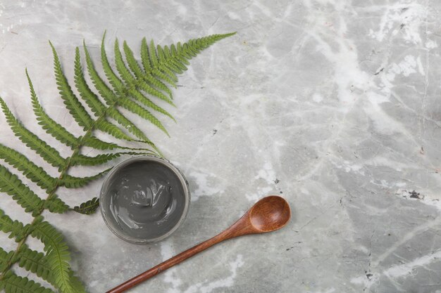 Flat lay cosmetic arrangement on marble background