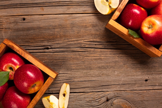 Flat-lay crate with ripe apples with copyspace