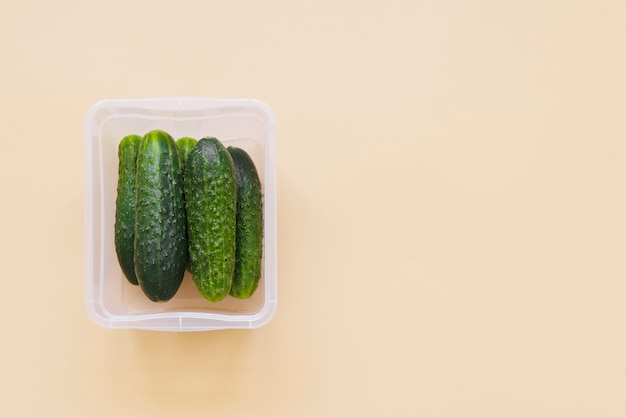 Flat lay of cucumbers with copy space