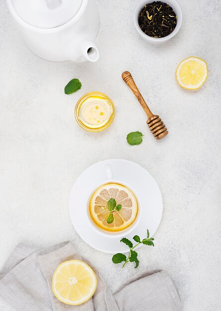 Flat lay cup with lemon tea