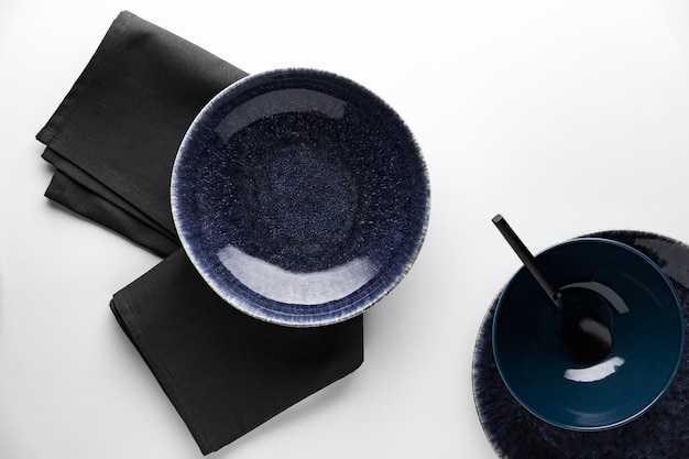 Free photo flat lay of dark dinnerware