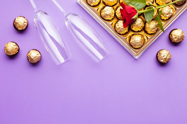 Flat lay decoration with chocolate box and copy-space