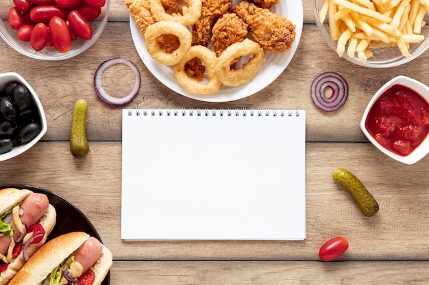 Flat lay decoration with food and notebook