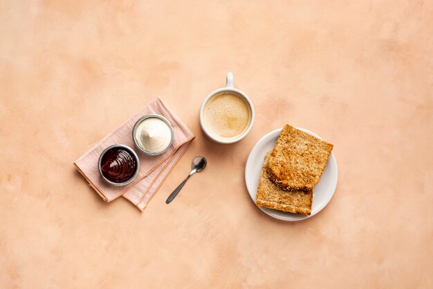 Flat lay decoration with toast and cappuccino