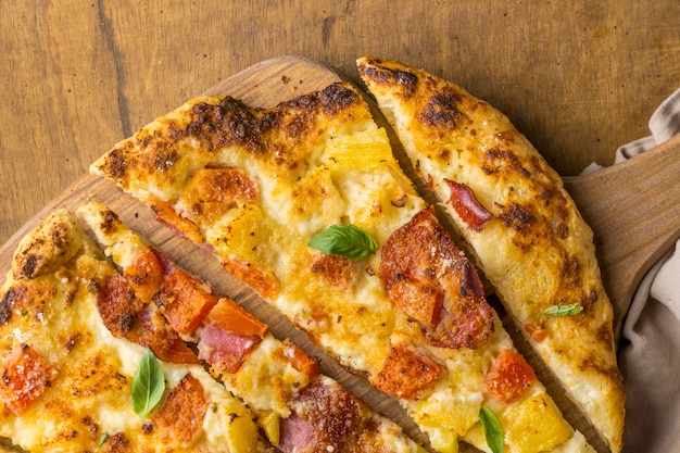 Free photo flat lay of delicious baked pineapple and papaya pizza