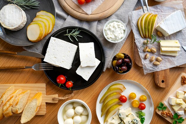 Flat lay delicious cheese on table