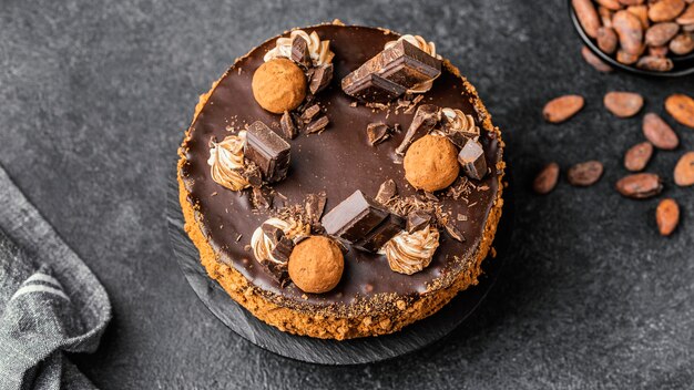 Flat lay of delicious chocolate cake on stand