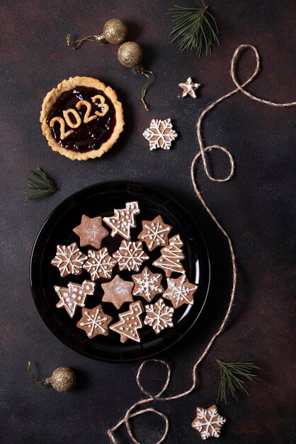 Flat lay delicious cookies new year celebration