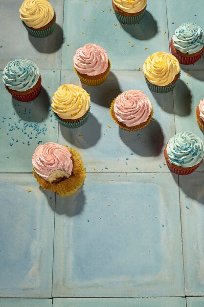 Flat lay delicious cupcakes arrangement