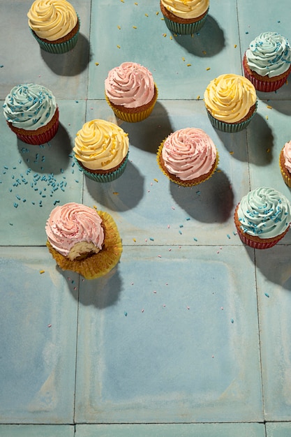 Flat lay delicious cupcakes arrangement