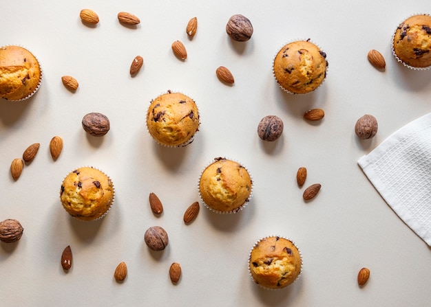 Free photo flat lay of delicious cupcakes concept