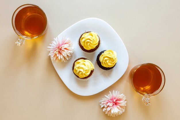 Flat lay of delicious cupcakes concept