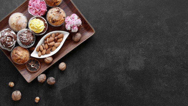 Flat lay of delicious cupcakes concept