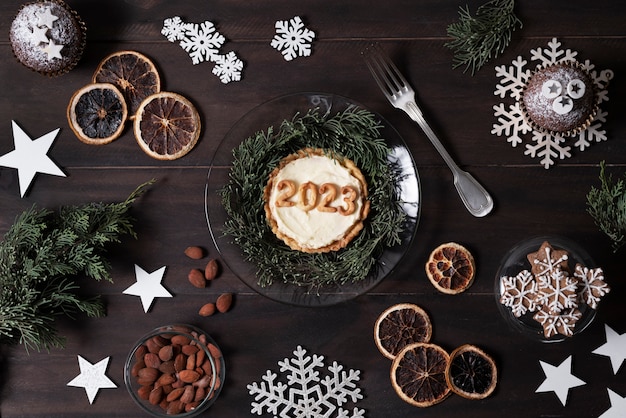 Free photo flat lay delicious dessert for new year