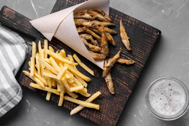 Flat lay of delicious fish and chips concept