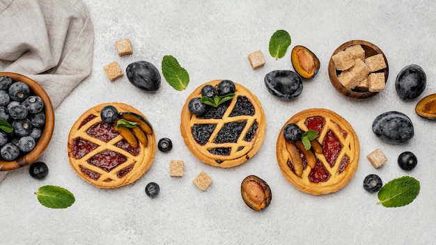 Flat lay of delicious fruit pies