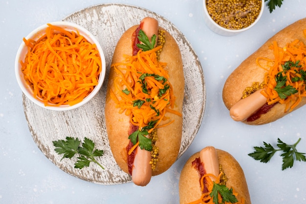 Flat lay delicious hot dogs arrangement