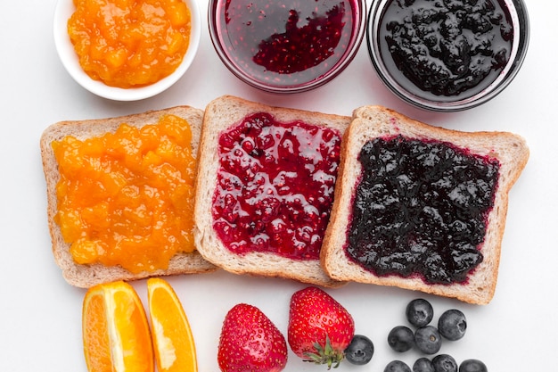 Flat lay delicious jam on bread