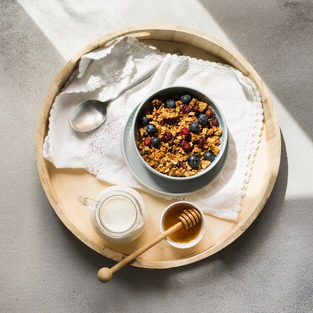 Free photo flat lay of delicious muesli in bowl