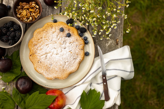 Flat lay delicious pie on table