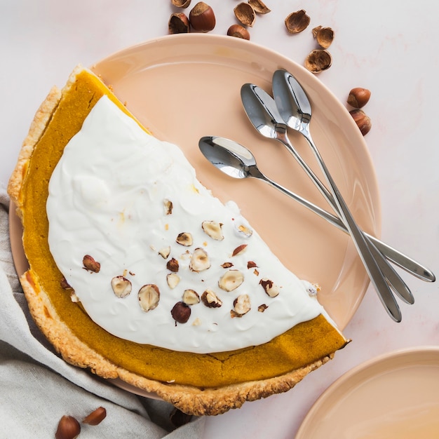 Free photo flat lay delicious pie with hazelnuts