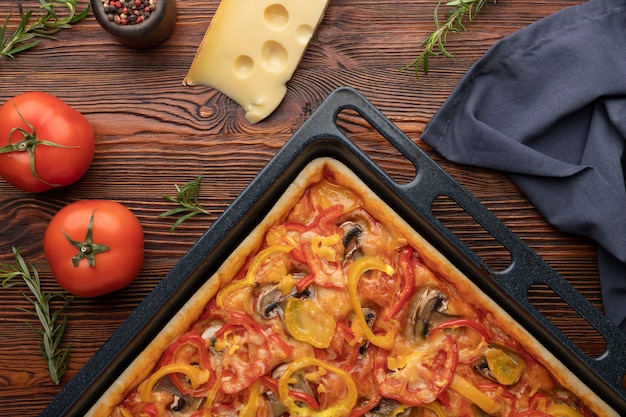 Free photo flat lay delicious pizza on tray