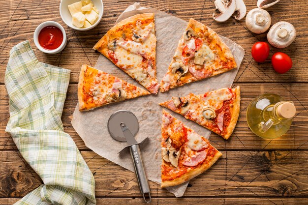 Flat lay of delicious pizza with mushrooms