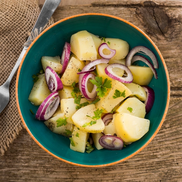 Flat lay delicious potato salad