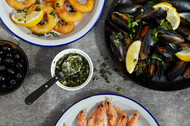 Flat lay delicious seafood on table arrangement