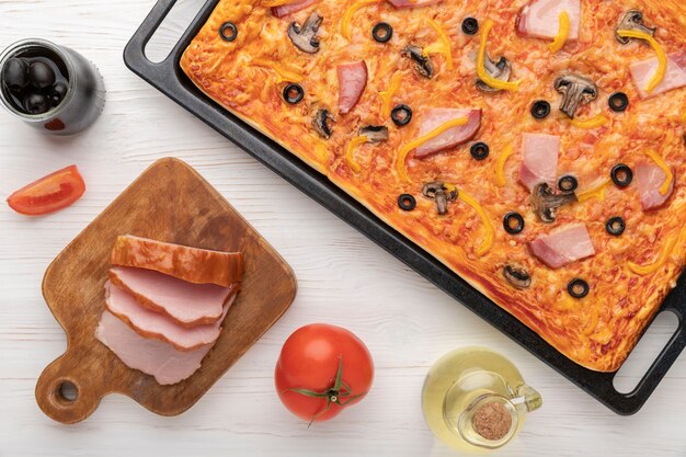 Flat lay delicious square pizza