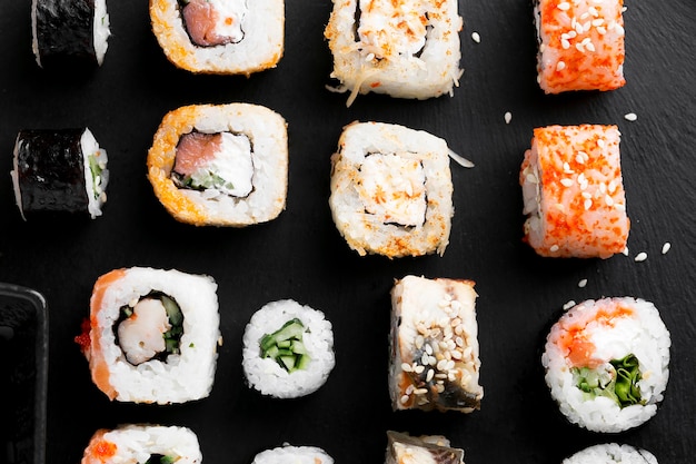 Flat lay delicious sushi aligned