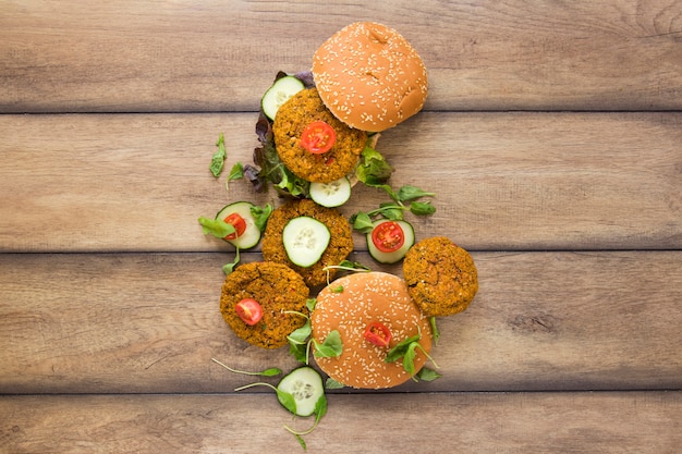 Free photo flat lay delicious vegan burgers