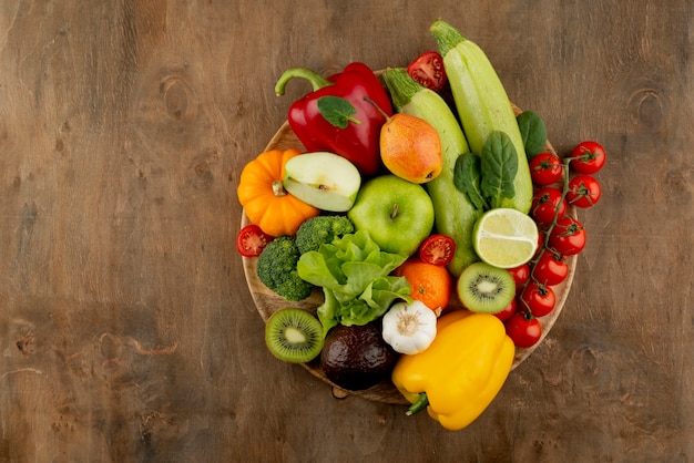 Flat lay delicious vegetables and fruits