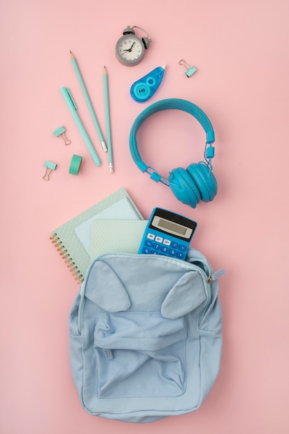 Flat lay desk arrangement with headphones