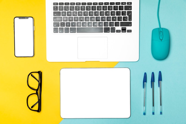 Flat lay desk concept with mock up devices