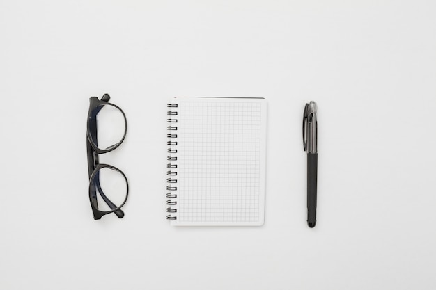 Flat lay desk concept with notepad