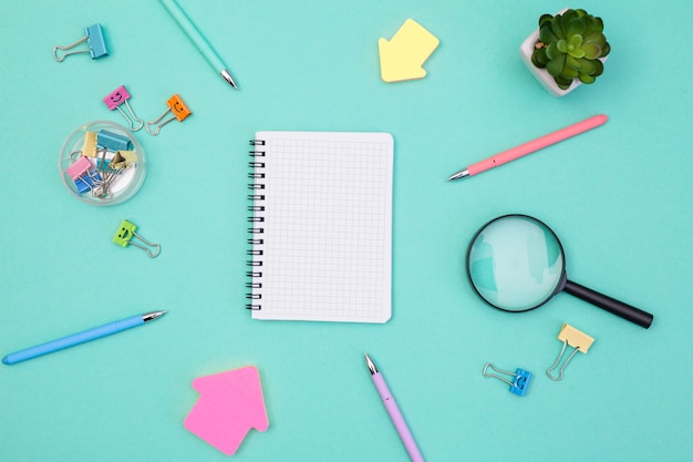 Flat lay desk concept with notepad